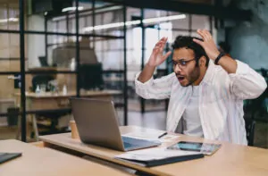 astonished man working with laptop while sitting a 2024 05 23 17 19 02 utc