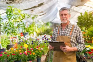 gardener or florist man working in a nursery insid 2024 12 09 01 07 28 utc
