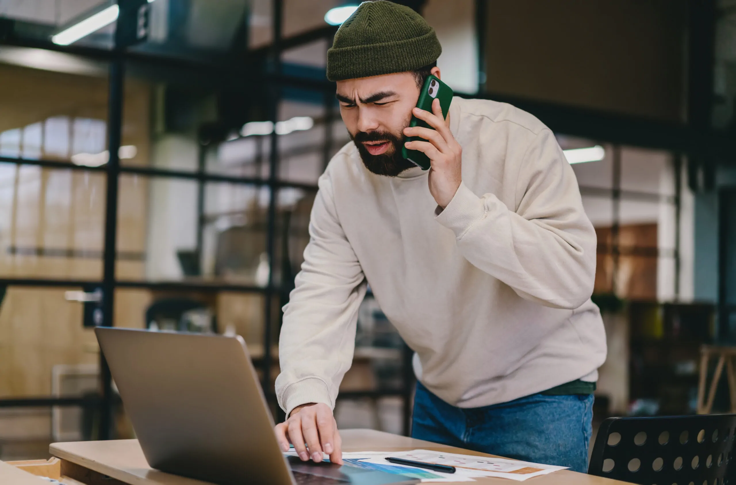 serious man talking on smartphone while browsing l 2024 05 23 17 19 02 utc 1
