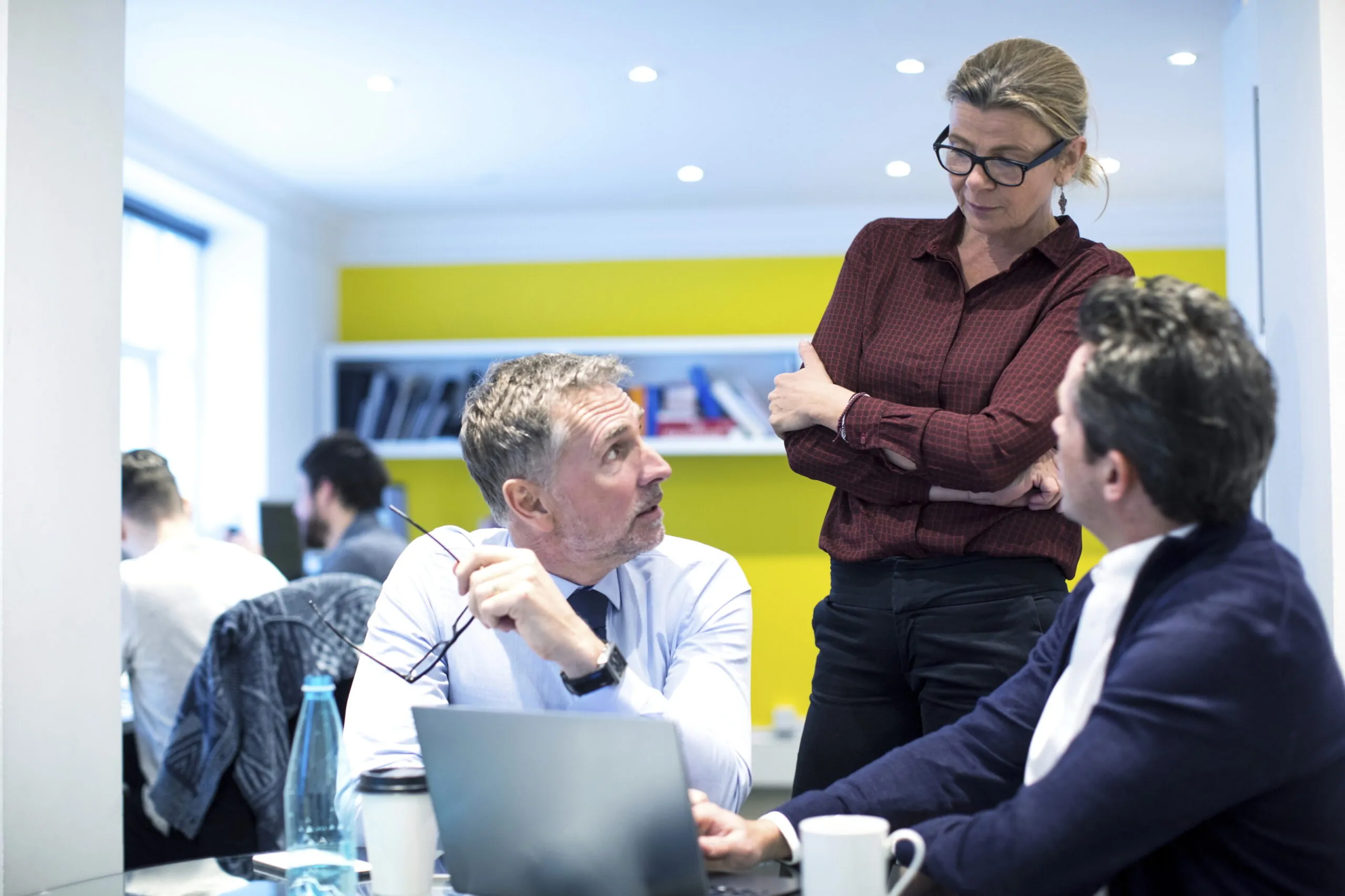 colleagues in office using laptop computer 2026 01 09 09 16 30 utc scaled